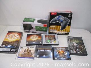 MaxSold Auction: Logitech RumblePad PC Controller, Xbox One AC Adapter, and 7 Assorted PC Games.  - Toronto (Ontario, Canada) SELLER MANAGED Estate Sale Online Auction - Annette Street