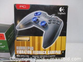 MaxSold Auction: Logitech RumblePad PC Controller, Xbox One AC Adapter, and 7 Assorted PC Games.  - Toronto (Ontario, Canada) SELLER MANAGED Estate Sale Online Auction - Annette Street