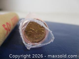 MaxSold Auction: Two Royal Canadian Mint 2011 Un-Opened Rolls Of Mint Condition, Uncirculated 2011 Pennies & One Roll Of Young Queen Elizabeth Unopened Mint Roll Of Pe - Toronto (Ontario, Canada) SELLER MANAGED Estate Sale Online Auction - Annette Street
