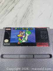 MaxSold Auction: Super Mario World  Super Nintendo Entertainment System - Toronto (Ontario, Canada) SELLER MANAGED Downsizing Online Auction - Pilkington