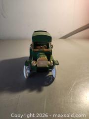 MaxSold Auction: vintage die-cast metal piggy bank  - Toronto (Ontario, Canada) SELLER MANAGED Downsizing Online Auction - Pilkington