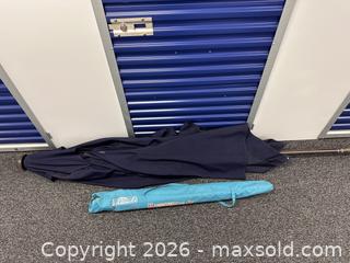 MaxSold Auction: 2 outdoor umbrellas - Hanover Township (Pennsylvania, USA) PARTNER MANAGED Downsizing Online Auction - Airport Road (STORAGE)              