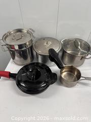MaxSold Auction: Allclad multipot, pressure cooker, calphalon 6-qt skillet with lid, calphalon 1.5-qt pot - Hanover Township (Pennsylvania, USA) PARTNER MANAGED Downsizing Online Auction - Airport Road (STORAGE)              
