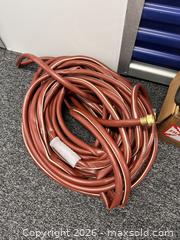 MaxSold Auction: hose, extension cord, grease gun, 5w30 motor oil, caulk gun, hammer, corded drill, hi-vis safety vest - Hanover Township (Pennsylvania, USA) PARTNER MANAGED Downsizing Online Auction - Airport Road (STORAGE)              