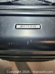 MaxSold Auction: Skyline Hard Suitcase - Hanover Township (Pennsylvania, USA) PARTNER MANAGED Downsizing Online Auction - Airport Road (STORAGE)              