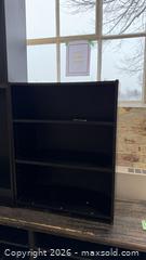 MaxSold Auction: Low black bookcase - Mississauga (Ontario, Canada) SELLER MANAGED Charity/Fundraising Online Auction - Lakeshore Road East