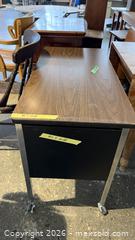 MaxSold Auction: Small metal desk on casters - Mississauga (Ontario, Canada) SELLER MANAGED Charity/Fundraising Online Auction - Lakeshore Road East