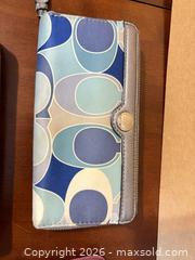 MaxSold Auction: Coach Wallets and Wristlets lot of 4 pcs -sc - Maple Ridge (British Columbia, Canada) PARTNER MANAGED Estate Sale Online Auction - Blanshard Street