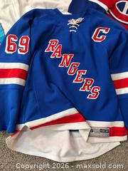 MaxSold Auction: Lot of 5 XL Sports Jerseys - Hockey & Football Teams -rh - Maple Ridge (British Columbia, Canada) PARTNER MANAGED Estate Sale Online Auction - Blanshard Street