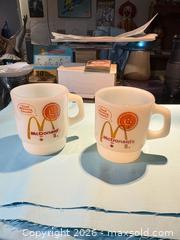 MaxSold Auction: Set of 2 McDonald's "Good Morning Canada" Milk Glass Mugs Fire-King - great shape! - Maple Ridge (British Columbia, Canada) PARTNER MANAGED Estate Sale Online Auction - Blanshard Street