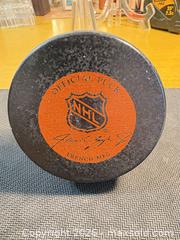 MaxSold Auction: Vancouver Canucks Signed NHL Official Trench Rubber Hockey Puck - Maple Ridge (British Columbia, Canada) PARTNER MANAGED Estate Sale Online Auction - Blanshard Street