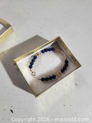 MaxSold Auction: Lapis and pearl Bracelet with gold clasp - Upper Moreland Township (Pennsylvania, USA) SELLER MANAGED Charity/Fundraising Online Auction - Davisville Road
