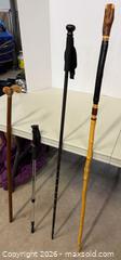 MaxSold Auction: Lot of 4 Mixed Walking Canes & Hiking Poles, Wood and Metal - Lakeshore (Ontario, Canada) PARTNER MANAGED Downsizing Online Auction - County Road 42
