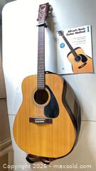 MaxSold Auction: Yamaha F-310 Acoustic (steel-string) Dreadnought Guitar - Natural - Lakeshore (Ontario, Canada) PARTNER MANAGED Downsizing Online Auction - County Road 42