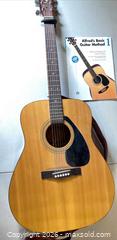 MaxSold Auction: Yamaha F-310 Acoustic (steel-string) Dreadnought Guitar - Natural - Lakeshore (Ontario, Canada) PARTNER MANAGED Downsizing Online Auction - County Road 42