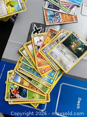 MaxSold Auction: Pokemon Card Lot 427pcs w/ Japanese Cards Books Posters Accessories 2005–2017 - Vancouver (British Columbia, Canada) SELLER MANAGED Reseller Online Auction - E 7th Avenue (STORAGE)