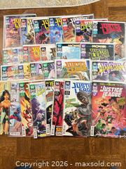 MaxSold Auction: Justice League Comics - Toronto (Ontario, Canada) SELLER MANAGED Downsizing Online Auction - Massey Square (CONDO)