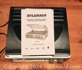 MaxSold Auction: Sylvania USB Turntable & AM/FM Radio Combo – Vinyl to MP3 Encoder - Oshawa (Ontario, Canada) SELLER MANAGED Estate Sale Online Auction - Salisbury Street