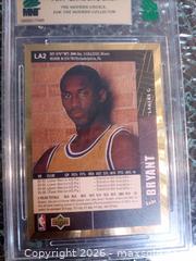 MaxSold Auction: 1996-97 Upper Deck Collector's Choice Kobe Bryant Card - Township Of Brock (Ontario, Canada) SELLER MANAGED Downsizing Online Auction - Beechwood Avenue