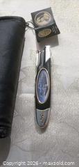 MaxSold Auction: Franklin Mint Collectible Folding Pocket Cutter, Black & Chrome - Township Of Brock (Ontario, Canada) SELLER MANAGED Downsizing Online Auction - Beechwood Avenue