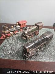 MaxSold Auction: Lot of Three Toy Train Locomotives - Tin, Die-cast & Plastic - Township Of Brock (Ontario, Canada) SELLER MANAGED Downsizing Online Auction - Beechwood Avenue
