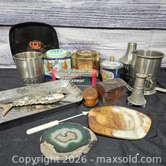 MaxSold Auction: Assorted Collectible Tins, Metal Tankards & Stone Display Pieces Mother of Pearl Reticulated Fish Bottle Opener - Hatboro (Pennsylvania, USA) PARTNER MANAGED Estate Sale Online Auction - Jacksonville Road
