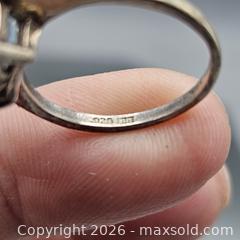 MaxSold Auction: Sterling Silver Ring with Emerald-Cut Blue Topaz, Size 7 - Hatboro (Pennsylvania, USA) PARTNER MANAGED Estate Sale Online Auction - Jacksonville Road