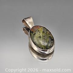 MaxSold Auction: Unakite/Epidote Green Stone Pendant with Silver Metal - Hatboro (Pennsylvania, USA) PARTNER MANAGED Estate Sale Online Auction - Jacksonville Road