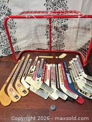 MaxSold Auction: T60 Mini hockey sticks and net  - Toronto (Ontario, Canada) SELLER MANAGED Downsizing Online Auction -  The Kingsway