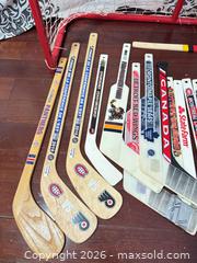 MaxSold Auction: T60 Mini hockey sticks and net  - Toronto (Ontario, Canada) SELLER MANAGED Downsizing Online Auction -  The Kingsway