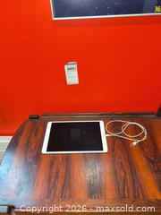 MaxSold Auction: IPad and Charging Cable - Baltimore (Maryland, USA) PARTNER MANAGED Estate Sale Online Auction - Ken Oak Road