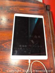 MaxSold Auction: IPad and Charging Cable - Baltimore (Maryland, USA) PARTNER MANAGED Estate Sale Online Auction - Ken Oak Road