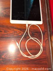 MaxSold Auction: IPad and Charging Cable - Baltimore (Maryland, USA) PARTNER MANAGED Estate Sale Online Auction - Ken Oak Road