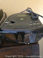 MaxSold Auction: Lot of 4–6 Sony & Roku Players and Remotes - Baltimore (Maryland, USA) PARTNER MANAGED Estate Sale Online Auction - Ken Oak Road