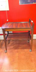 MaxSold Auction: Mid-Century Rosewood Veneer Bar Cart on Casters - Baltimore (Maryland, USA) PARTNER MANAGED Estate Sale Online Auction - Ken Oak Road