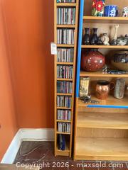 MaxSold Auction: Tall Light Oak Veneer CD Tower / Media Rack includes CD’s - Baltimore (Maryland, USA) PARTNER MANAGED Estate Sale Online Auction - Ken Oak Road