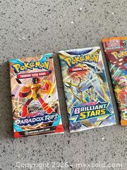 MaxSold Auction: Pokemon Sealed Booster Lot 13  - Vancouver (British Columbia, Canada) SELLER MANAGED Estate Sale Online Auction -  East 7th Avenue (STORAGE)