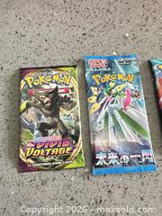 MaxSold Auction: Pokemon Sealed Booster Lot 14 - Vancouver (British Columbia, Canada) SELLER MANAGED Estate Sale Online Auction -  East 7th Avenue (STORAGE)