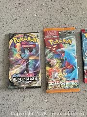 MaxSold Auction: Pokemon Sealed Booster Lot 27 - Vancouver (British Columbia, Canada) SELLER MANAGED Estate Sale Online Auction -  East 7th Avenue (STORAGE)