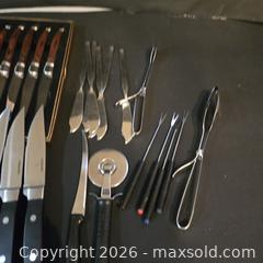 MaxSold Auction: MIXED CUTLERY LOT: 6 LAGUIOLE WOOD CUTTING UTENSILS, 8 BLACK STEAK KNIVES - Toronto (Ontario, Canada) SELLER MANAGED Downsizing Online Auction - St Edmunds Drive