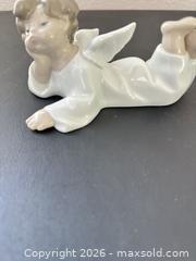 MaxSold Auction: Lladro Angel Lying Down 4541 - Los Angeles (California, USA) PARTNER MANAGED Estate Sale Online Auction - Shoup Avenue (CONDO)