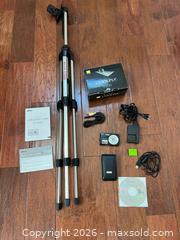 MaxSold Auction: Nikon Coolpix Camera and Tripod - Los Angeles (California, USA) PARTNER MANAGED Estate Sale Online Auction - Shoup Avenue (CONDO)
