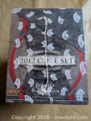 MaxSold Auction: 2012 magic core set booster battle pack - Welland (Ontario, Canada) SELLER MANAGED Reseller Online Auction - Young Road