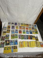 MaxSold Auction: Huge Lot Vintage Pokemon Cards Nintendo Video Game Cards 2016 - 2021  - Ottawa (Ontario, Canada) SELLER MANAGED Downsizing Online Auction - Prince Albert Street