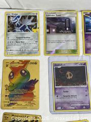MaxSold Auction: Huge Lot Vintage Pokemon Cards Nintendo Video Game Cards 2016 - 2021  - Ottawa (Ontario, Canada) SELLER MANAGED Downsizing Online Auction - Prince Albert Street