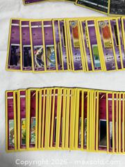 MaxSold Auction: Large Lot Of Pokemon Cards with Pokemon Storage Box  - Ottawa (Ontario, Canada) SELLER MANAGED Downsizing Online Auction - Prince Albert Street