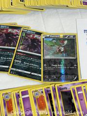 MaxSold Auction: Large Lot Of Pokemon Cards with Pokemon Storage Box  - Ottawa (Ontario, Canada) SELLER MANAGED Downsizing Online Auction - Prince Albert Street