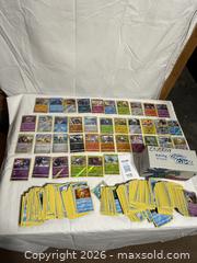 MaxSold Auction: large Lot Of Pokemon Player Cards Video Game Nintendo  - Ottawa (Ontario, Canada) SELLER MANAGED Downsizing Online Auction - Prince Albert Street