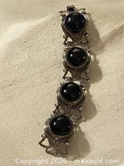 MaxSold Auction: Mexican Silver Bracelet with Black Onyx Cabochon - Toronto (Ontario, Canada) SELLER MANAGED Downsizing Online Auction - O'connor Drive (CONDO)