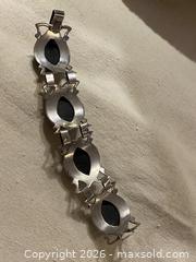 MaxSold Auction: Mexican Silver Bracelet with Black Onyx Cabochon - Toronto (Ontario, Canada) SELLER MANAGED Downsizing Online Auction - O'connor Drive (CONDO)